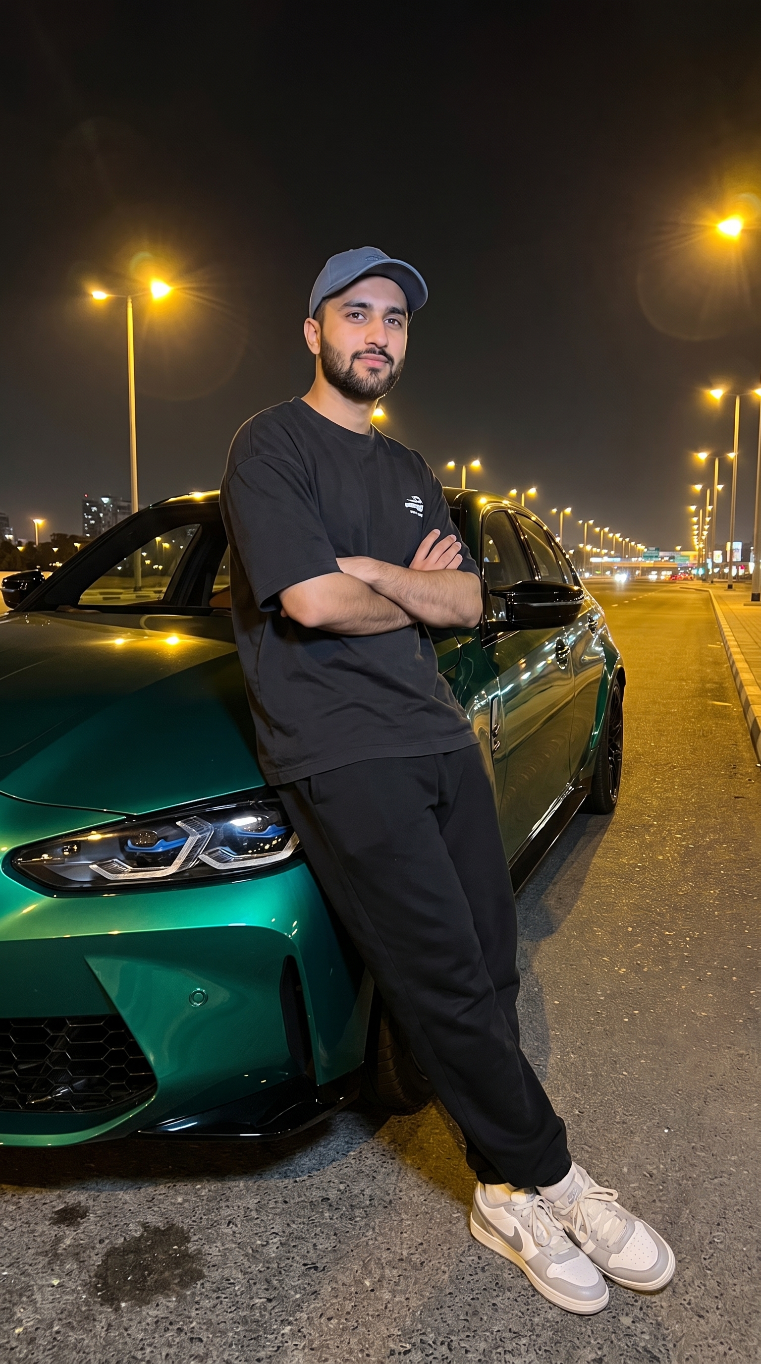 Example output for Man Beside Emerald-Green Sports Sedan at Night